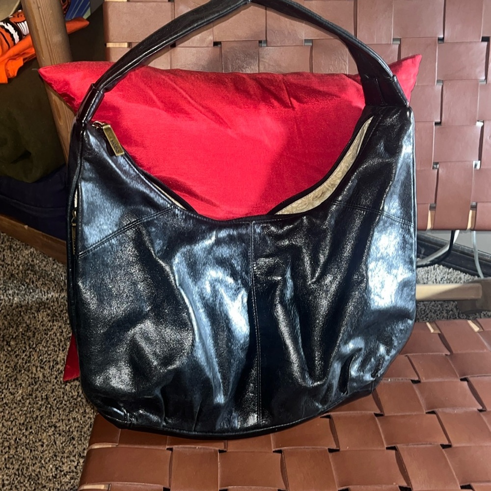 HOBO Black purse with secret side pocket.